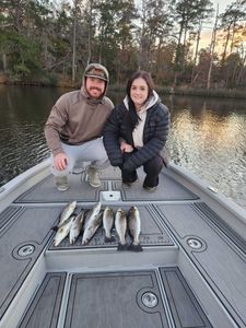Three sea trout and spotted weakfish caught by two people fishing in New Bern