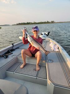 Angler fishing in New Bern, with a 17-inch catch