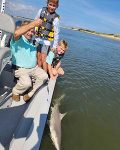 Three people fishing in New Bern