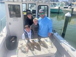 4 people fishing in Brigantine