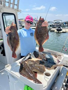 Three southern flounder, fishing in Brigantine