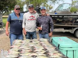 Three people fishing in Gordonville