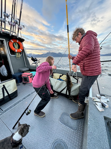 Two anglers posing with their catch in Newport
