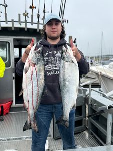 Two coho salmon caught while fishing in OR