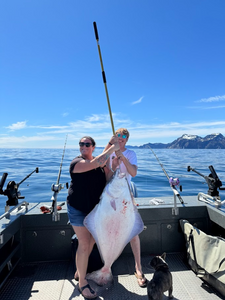 Angler holding large fish in OR