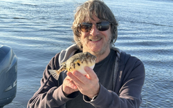 Angler holding a fish in SC