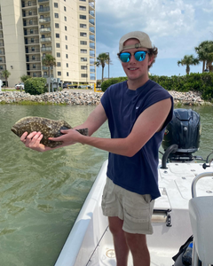 An angler with their catch of the day in North Myrtle Beach