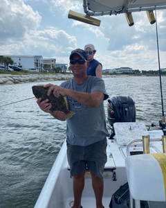 An angler casts their line in the waters of SC