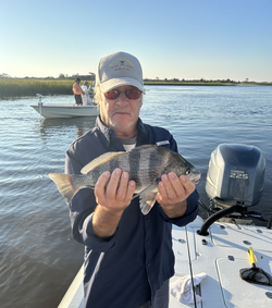 Angler with a big black drum fish caught in North Myrtle Beach