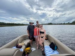 5 people fishing on the shore of SC