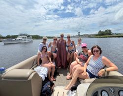 Group of 8 people fishing at North Myrtle Beach