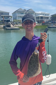 Impressive catch of a Pacific Halibut fishing in North Myrtle Beach