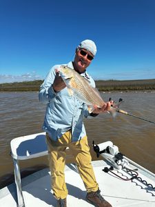 A person fishing in Corpus Christi