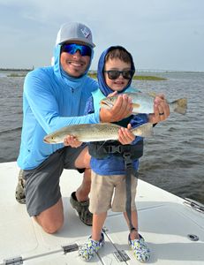 Two speckled trout caught during fishing tour in Port Aransas TX