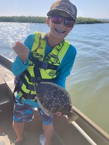 Freshly caught stingray held on fishing boat in Port Aransas TX waters