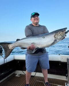 Reeling in another solid fish in Lake ontario.