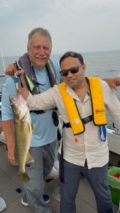 Two people fishing in NY