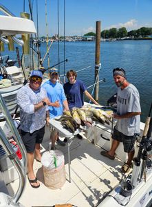 4 people fishing in NY