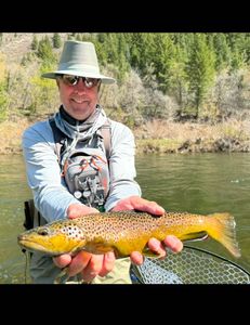 Angler with a 22-inch fish in Provo