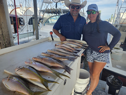 Rain can't dampen the thrill of deep sea light tackle action!