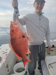 Angler holding a 22-inch fish in FL
