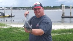 A person fishing in Jacksonville, Florida