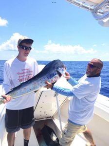 2 anglers fishing on boat in Florida