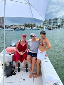 Three people enjoying a cruises and fishing trip in Pompano Beach