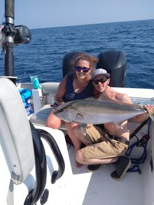 A longfin yellowtail fish caught on a fishing trip in North Carolina