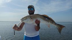 Angler holding a fishing rod in Sarasota