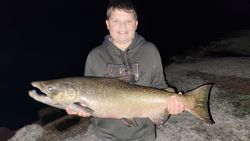 Chinook salmon catch displayed at night in Elma New York