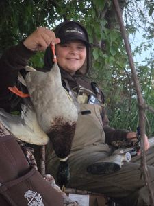 Harvested goose displayed outdoors in Elma New York hunting scene