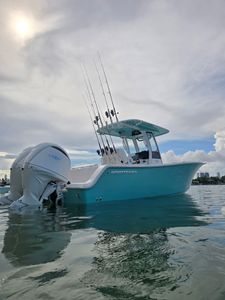 Four people enjoy a scenic cruises and fishing trip in Key Biscayne