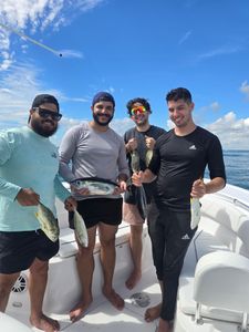 4 people enjoying a fishing cruise in FL