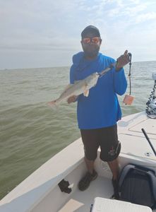 A person fishing in Texas City