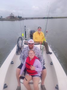 Group of 3 people fishing in Texas City