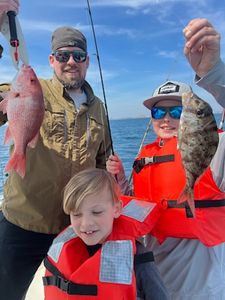 2 fishing people catching fish in FL