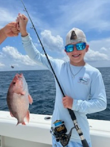 A person fishing in Panama City Beach