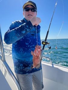 Angler holds a fish in Florida