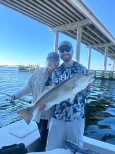 Lovely couple fishing in Fort Walton