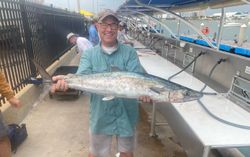 King mackerel catch displayed on fishing boat deck at Port Canaveral FL