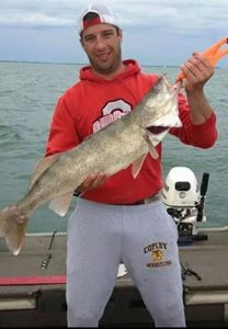One fisherman catching a 21-inch fish in Marblehead