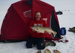 Lone fisherman in Marblehead landing a 23-inch catch