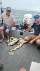 Anglers with fishing equipment in Marblehead