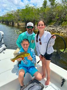 4 people fishing in Miami