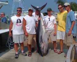 7 people fishing in the ocean at Ocean City