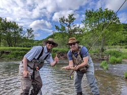 Two people fishing in Wisconsin Rapids