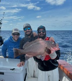 3 people fishing in North Bay Village
