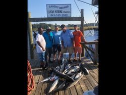 5 people fishing in North Carolina