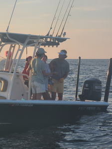 Partly cloudy skies set the stage for an epic day of deep sea fishing!